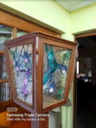 stained glass with bird designs